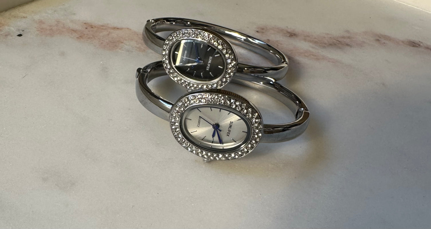 Silver oval watch