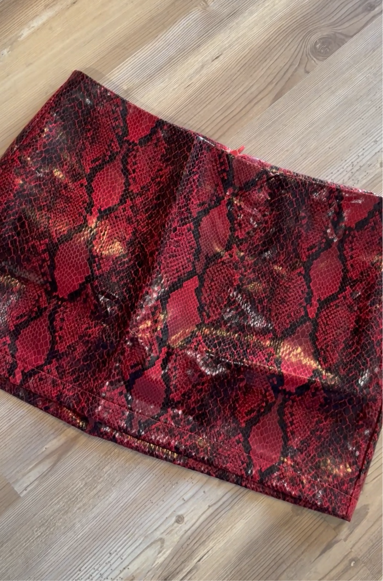 Red snake print mini skirt